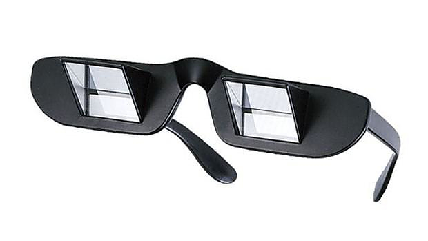 Prism bed glasses for layback reading.