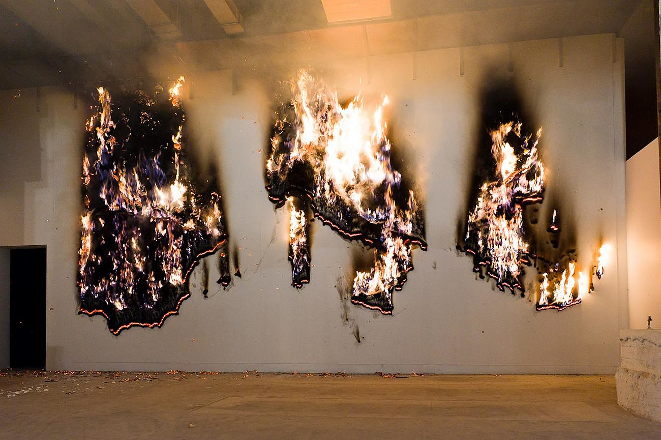 P.I.G.S. A Burning Art Installation by Claire Fontaine.