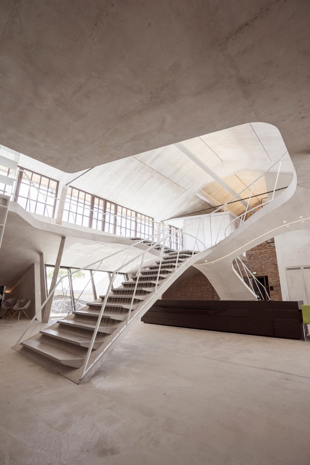 Loft Panzerhalle by Smartvoll Architekten.